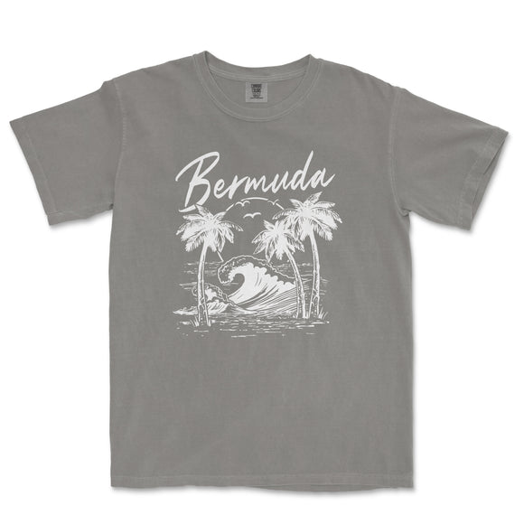 a gray shirt with a picture of a wave and palm trees