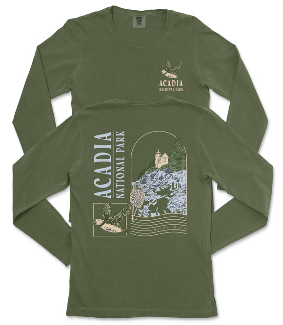 a green long-sleeved t-shirt with a graphic design depicting a scenic view of Acadia National Park.
