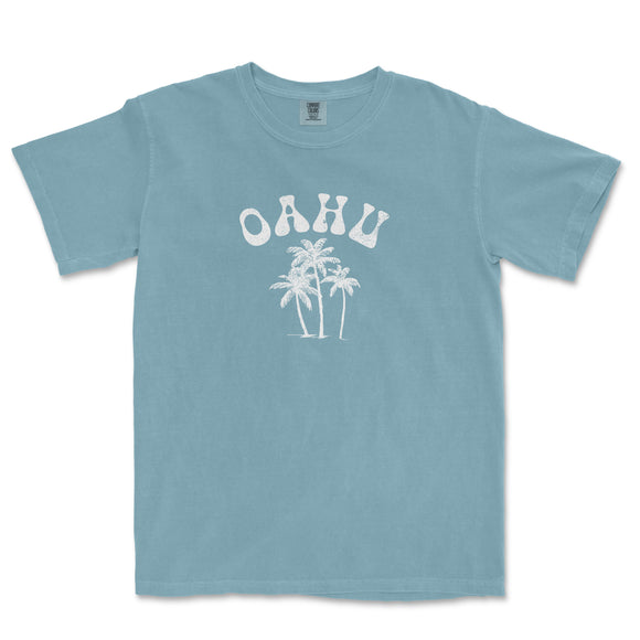 a blue shirt with a palm tree and the word ohu on it