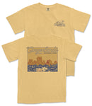 A yellow t-shirt with a graphic design depicting a scenic landscape with mountains and water.