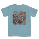 a blue t - shirt with a picture of the national park