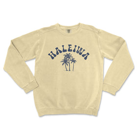 a sweatshirt with a palm tree and the words halewood on it