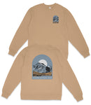 a tan sweatshirt with a graphic design depicting a mountain landscape and a large moon.