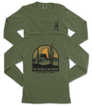 A green long-sleeved t-shirt with a graphic design depicting a desert landscape with a cactus and a sunset.