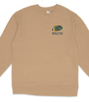 A tan long-sleeved shirt with a graphic of a fish on the left side and the text "BISCAYNE NATIONAL PARK" printed on the right side.