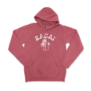 a pink hoodie with palm trees printed on it