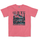 a pink t - shirt with a picture of a mountain
