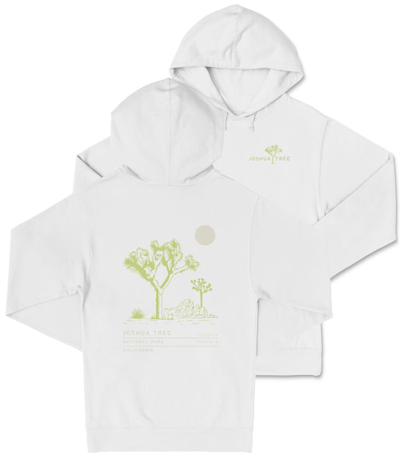 A white hooded sweatshirt with a graphic design depicting a desert landscape with a tree and a moon.