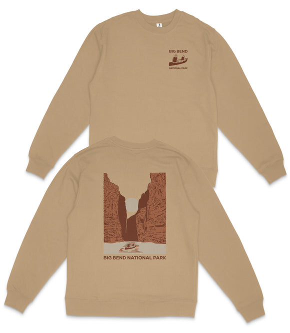a beige sweatshirt with a graphic design depicting a canyon or valley, along with text that reads "Big Bend National Park".