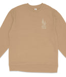 A beige long-sleeved shirt with a small white graphic on the left side.