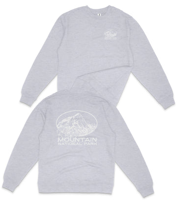 A gray sweatshirt with a mountain and national park logo printed on the back.
