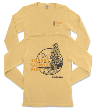a yellow long-sleeved t-shirt with a graphic design depicting a sequoia tree and mountains, along with the text "SEQUOIA NATIONAL PARK" and "CALIFORNIA" printed on it.