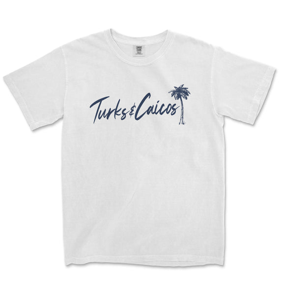 a white t - shirt with a palm tree in the background