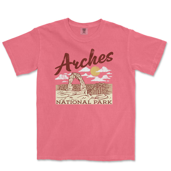 a pink shirt that says arches national park