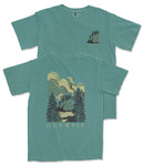A teal-colored t-shirt with a graphic design depicting a mountain landscape with pine trees and clouds.