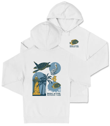 A white hoodie with a graphic design featuring a lighthouse, palm trees, and a turtle, along with the text "Biscayne National Park" printed on it.