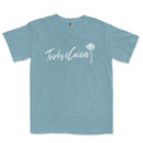 a blue t - shirt with the words tukes calicos written in white
