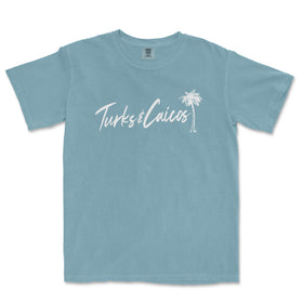 a blue t - shirt with the words tukes calicos written in white