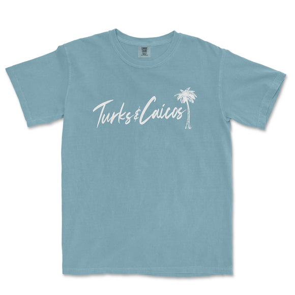 a blue t - shirt with the words tukes calicos written in white