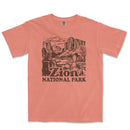 a pink t - shirt with a picture of a mountain