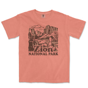 a pink t - shirt with a picture of a mountain