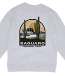 A gray sweatshirt with a graphic design depicting a desert landscape with two cacti and a sun in the background, along with the text "Saguaro National Park".