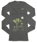 a gray long-sleeved t-shirt with a graphic design depicting a tree and a moon on the back.