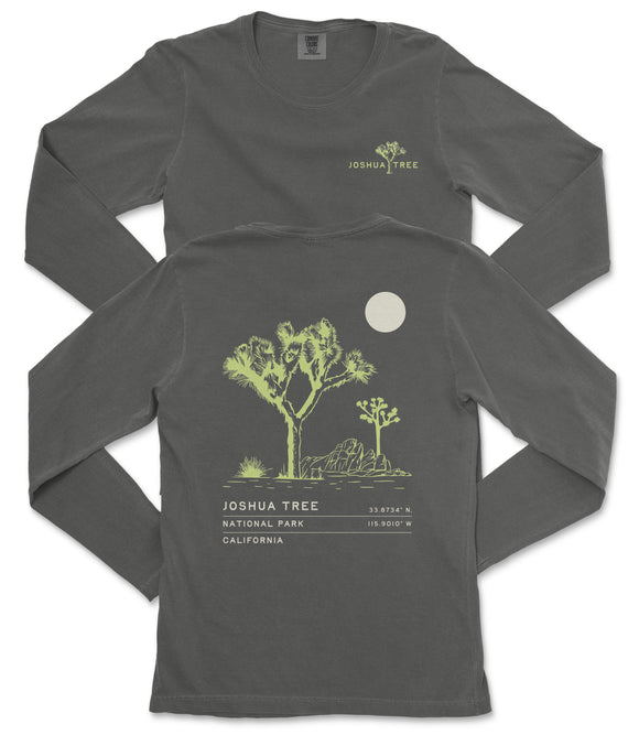 a gray long-sleeved t-shirt with a graphic design depicting a tree and a moon on the back.