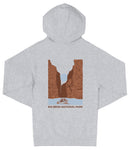 A grey hooded sweatshirt with a graphic design depicting a canyon and a boat on a river.