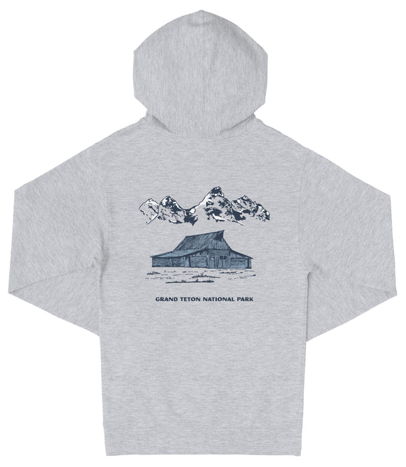 A gray hooded sweatshirt with a graphic design depicting a cabin and mountains in the background, along with the text "Grand Teton National Park".