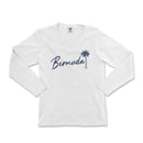a women's white long sleeve shirt with a palm tree and the word,