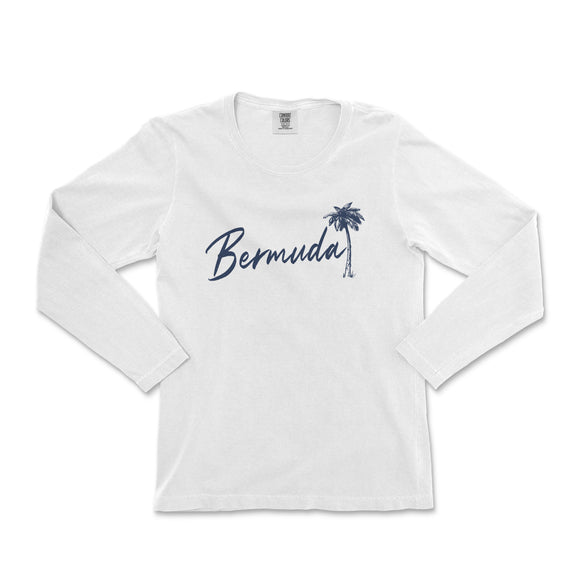 a women's white long sleeve shirt with a palm tree and the word,