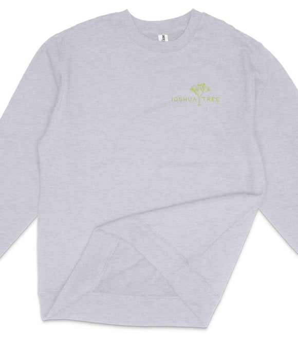 A gray long-sleeved shirt with a green logo on the left side.