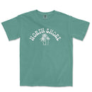 a green north shore t - shirt with palm trees