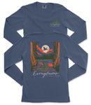 a long-sleeved blue t-shirt with a graphic design depicting a serene landscape with a lake, trees, and a bird in flight. The text on the t-shirt reads "Everyglades National Park" and "EVERYGLADES".