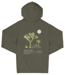 A dark green hoodie with a graphic design depicting a desert landscape, including a Joshua tree and a crescent moon.