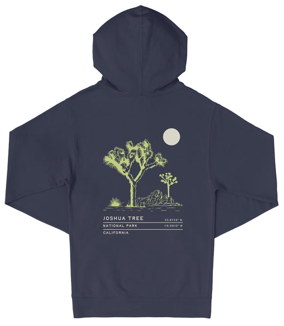 A navy blue hooded sweatshirt with a graphic design depicting a desert landscape with a tree and a moon.