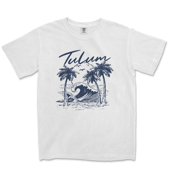 a white t - shirt with a picture of a wave and palm trees