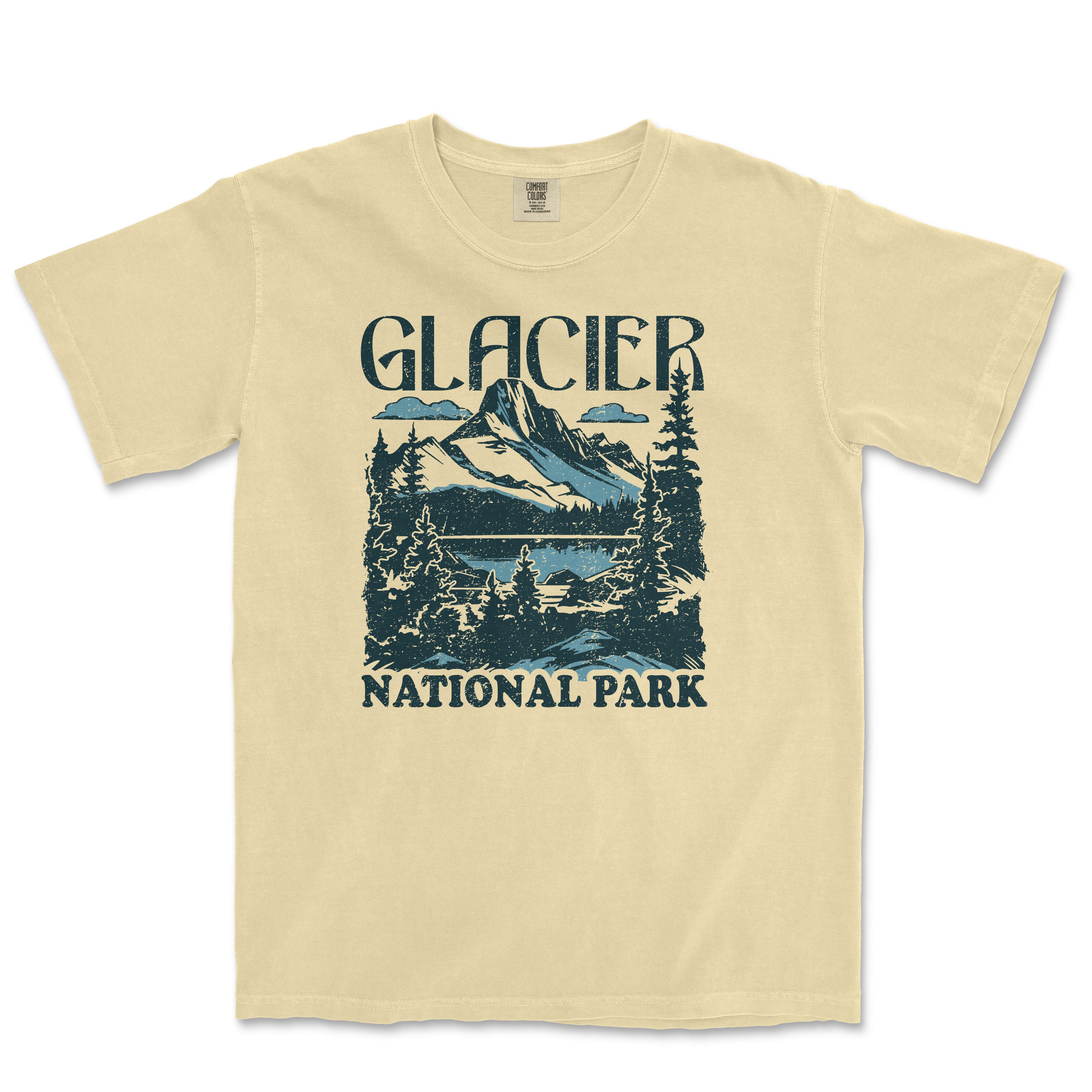 a yellow t - shirt with a picture of a mountain and lake