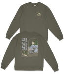 a grey sweatshirt with a graphic design on the back, depicting a scenic landscape with a castle, trees, and mountains.