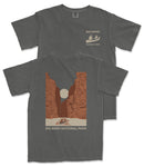 a gray t-shirt with a graphic design depicting a canyon landscape with a boat on a river. The text on the t-shirt reads "BIG BEND NATIONAL PARK" and "BIG BEND".