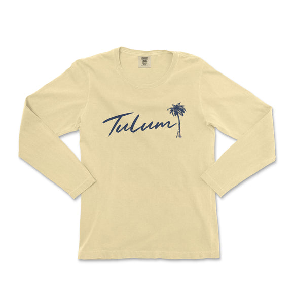 a women's long sleeve shirt with a palm tree in blue ink