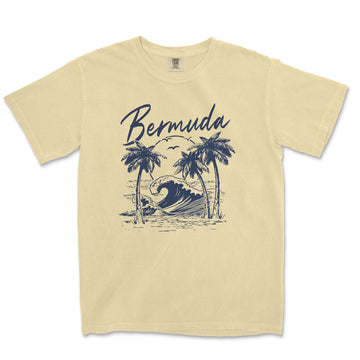 a t - shirt with a picture of a wave and palm trees