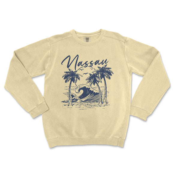 a sweatshirt with a picture of a wave and palm trees