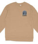 A beige long-sleeved shirt with a graphic design on the front, depicting a mountain range.