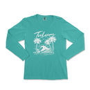 a women's turquoise long sleeve shirt with palm trees and a wave