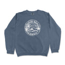 a blue sweatshirt with a white seal on it