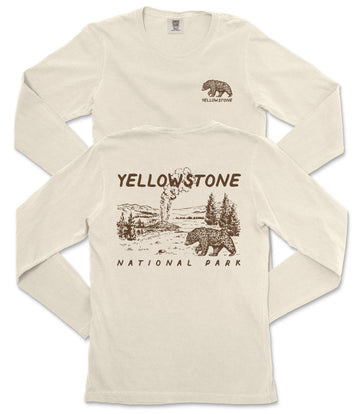 A cream-colored long-sleeved t-shirt with a graphic design depicting a bear and a landscape, along with the text "Yellowstone National Park" printed on the back.