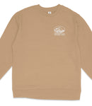 A beige long-sleeved shirt with a white logo on the left side.