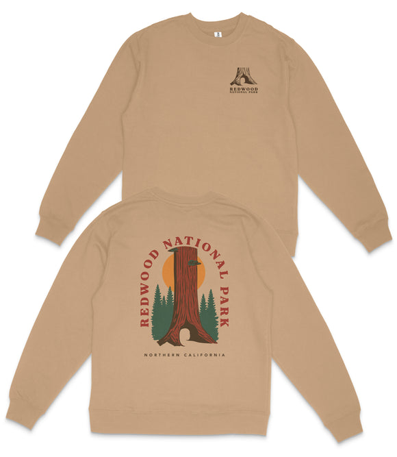 a beige sweatshirt with a graphic design on the back, depicting a tree and the text "REDWOOD NATIONAL PARK NORTHERN CALIFORNIA".